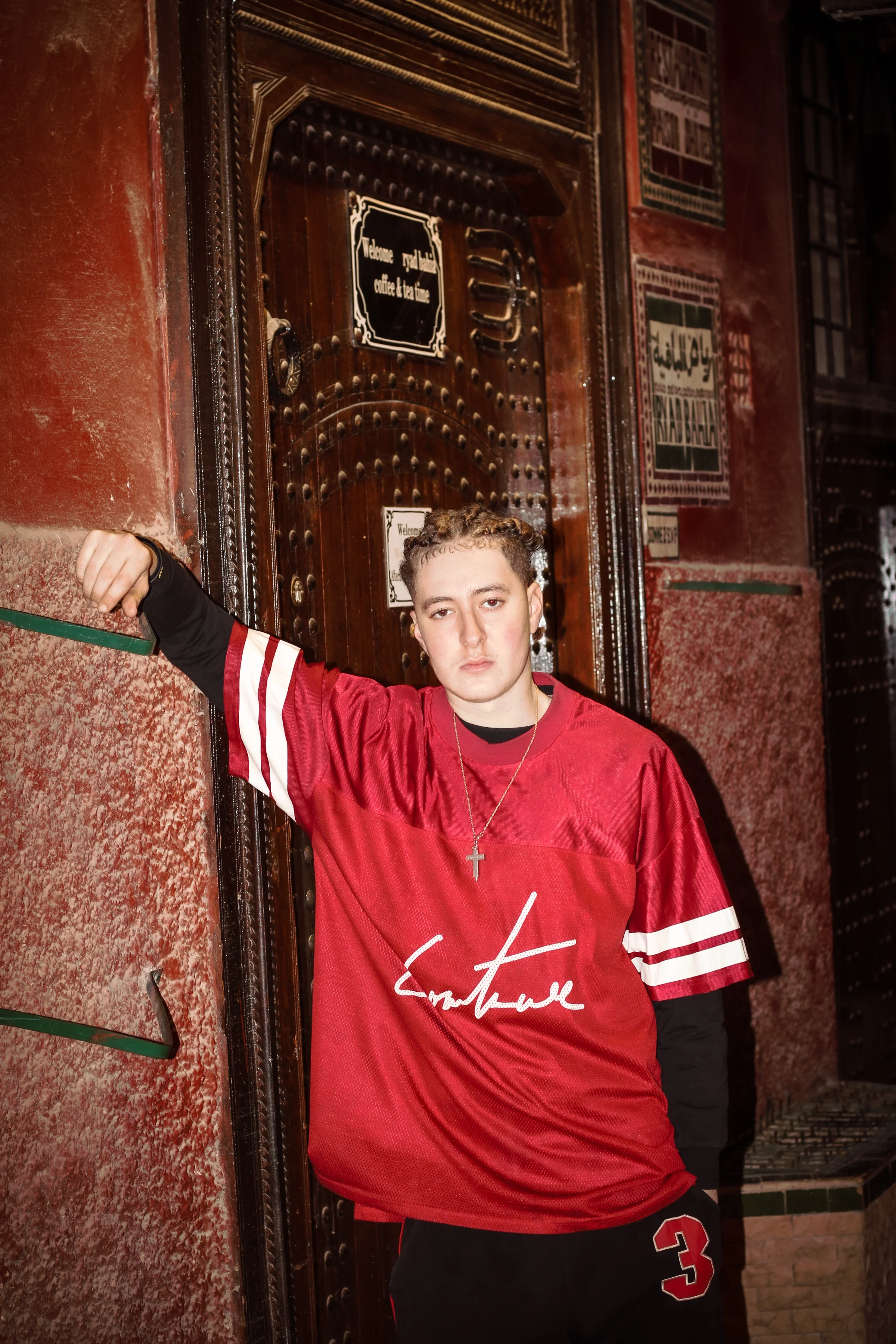 MEDINA STREET - red jersey vibe photography by Driss Nassiri