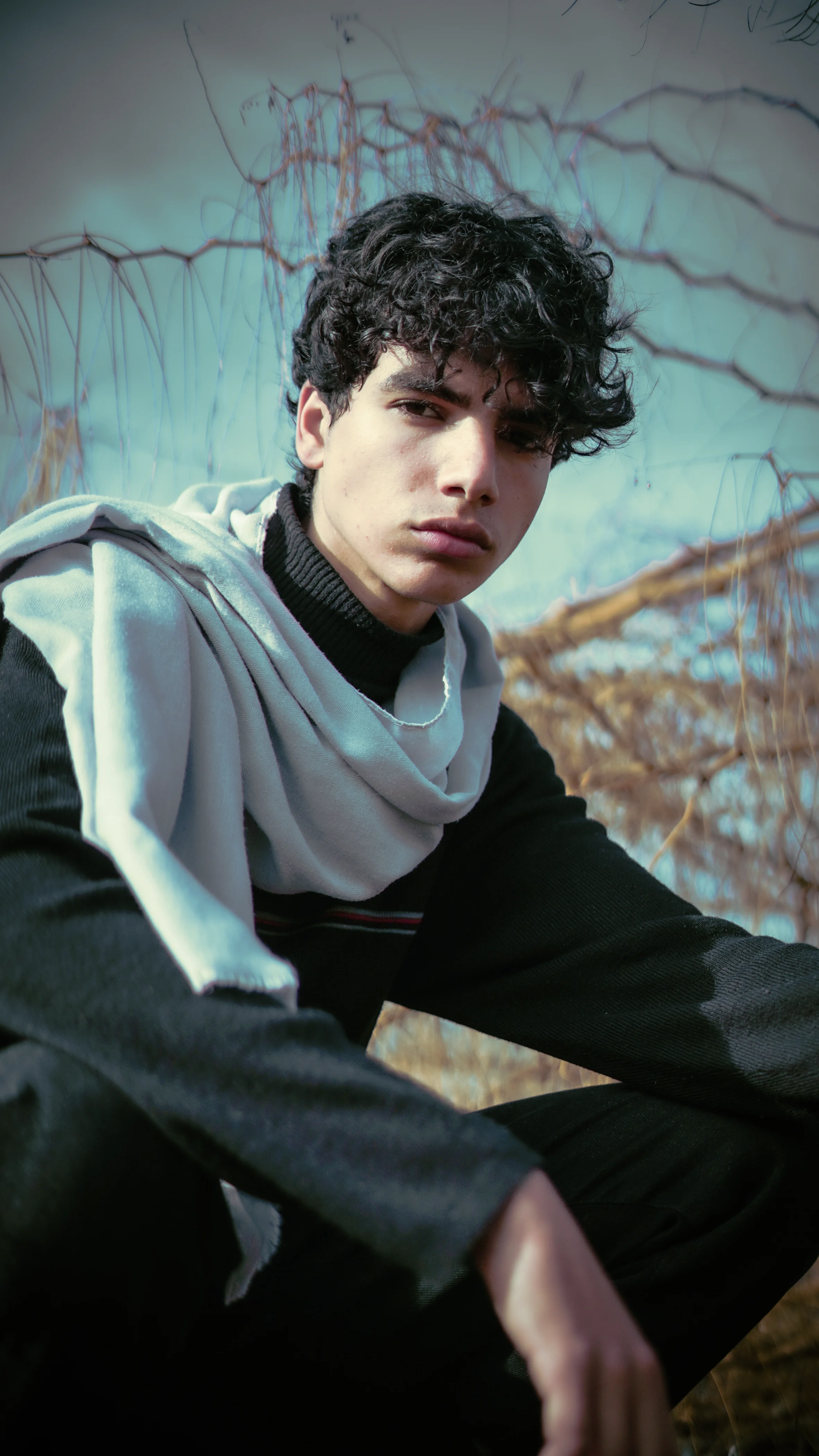 MODELS AGENCY - crouched editorial pose photography by Driss Nassiri