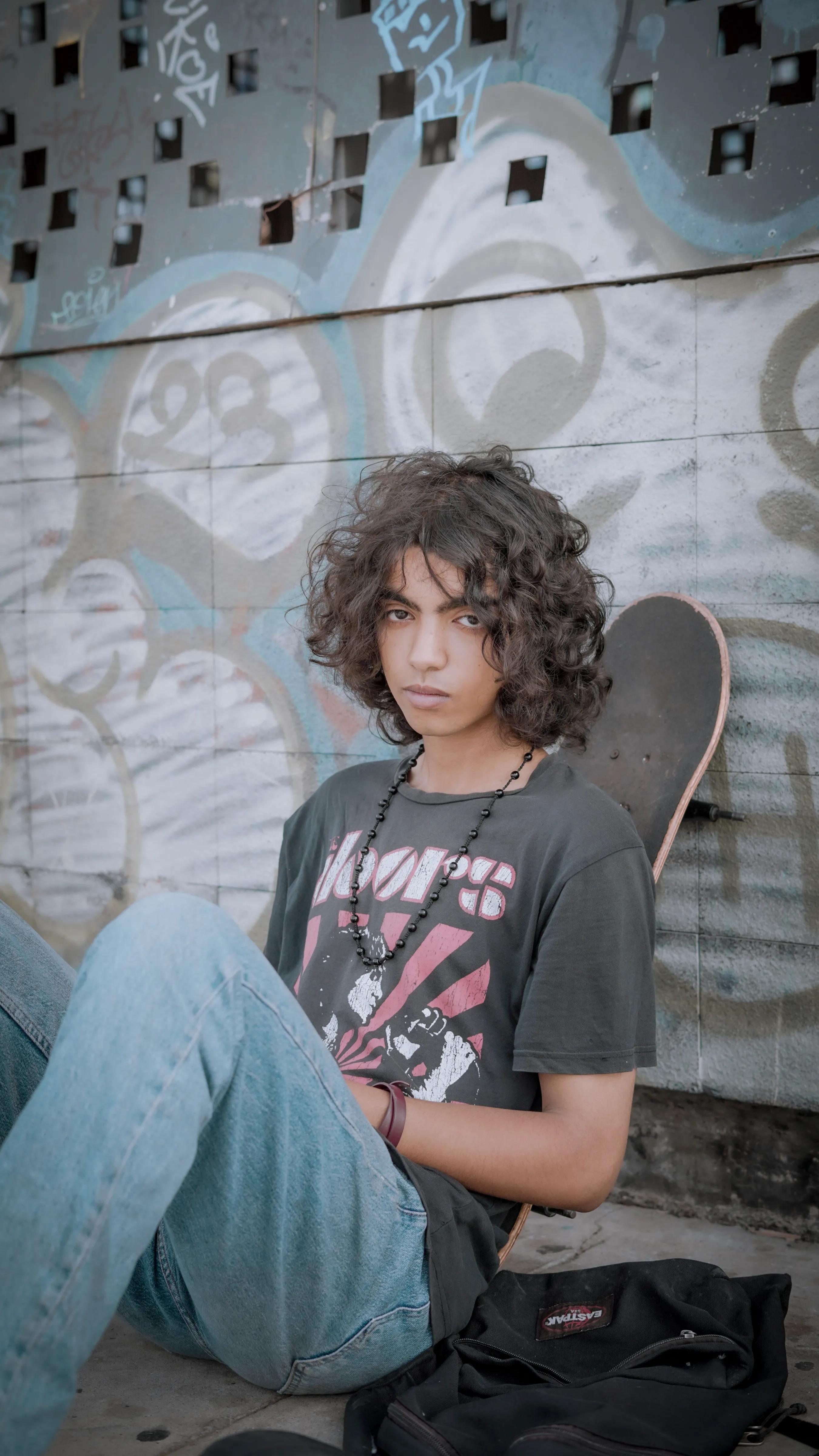 NEVADA - skateboard sitting pose photography by Driss Nassiri
